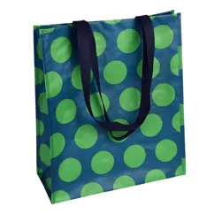 shopping bag - green on blue spotlight
