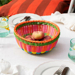panier rond en plastique tressé
