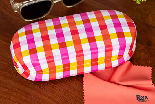 Colourful check-patterned glasses case with a cleaning cloth and sunglasses.
