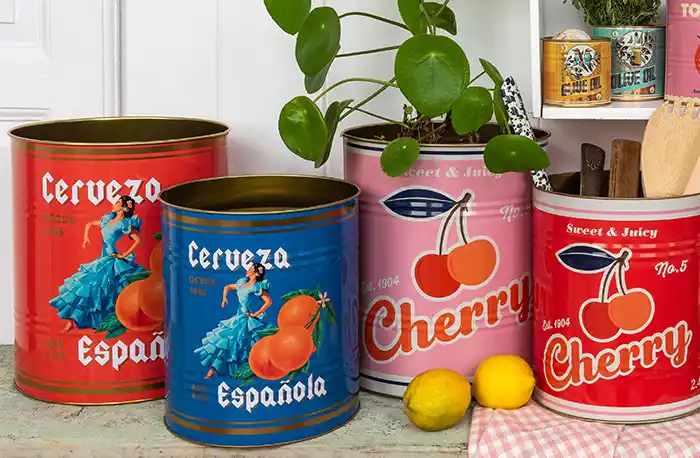 Colourful vintage-style metal tins on a kitchen counter