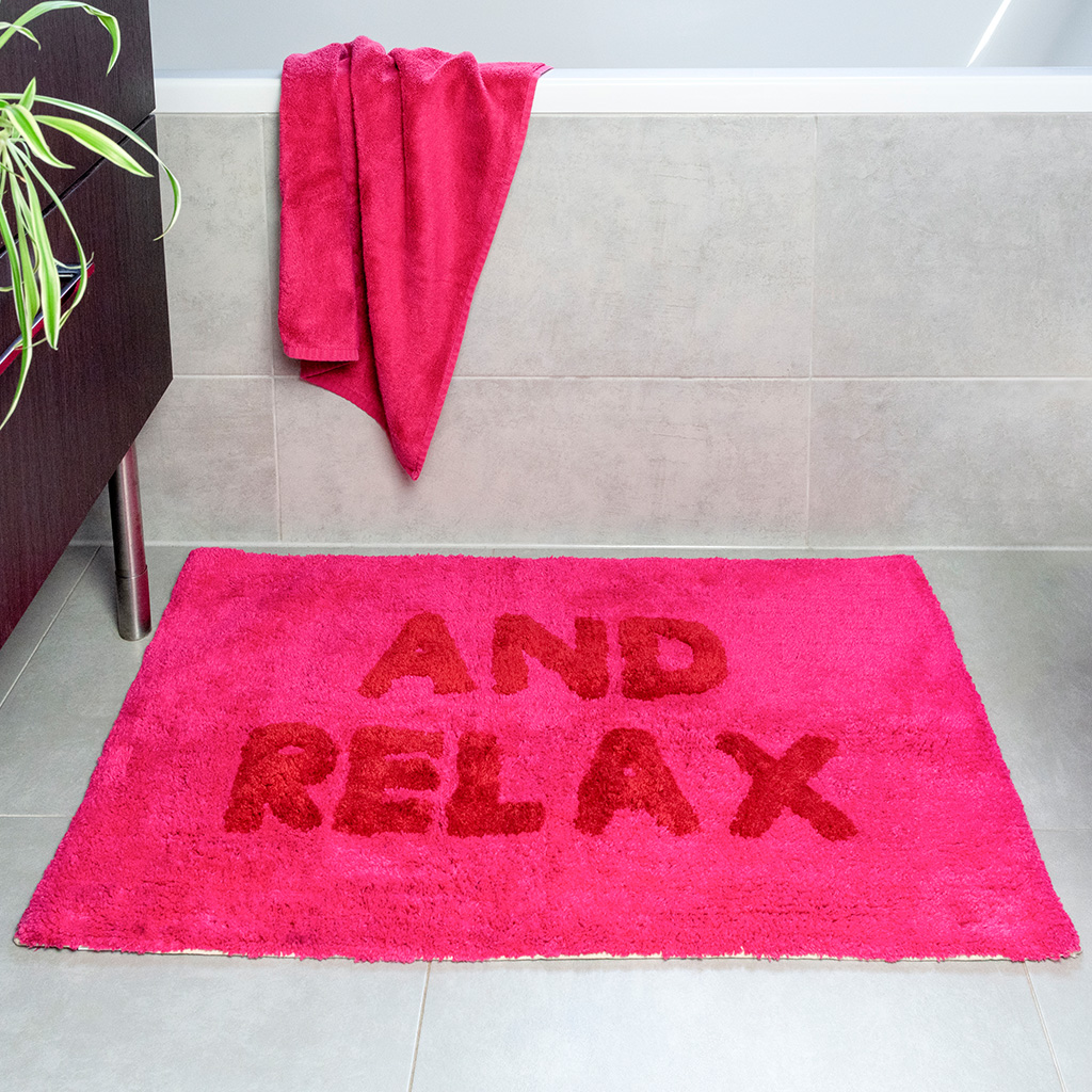 tufted cotton bath mat - 'and relax' pink