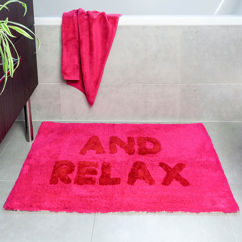 tufted cotton bath mat - 'and relax' pink