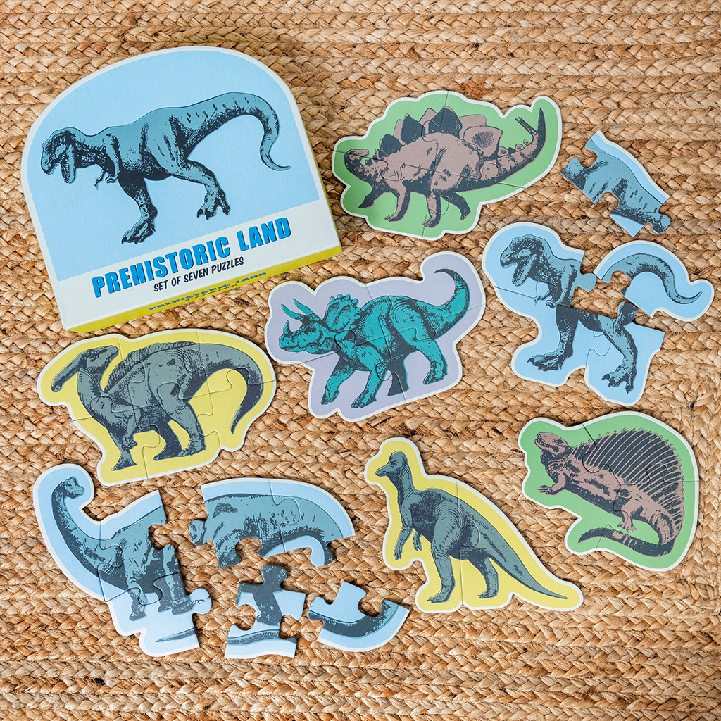 ensemble de sept puzzles prehistoric land