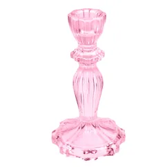 großer kerzenständer aus pinkfarbenem glas