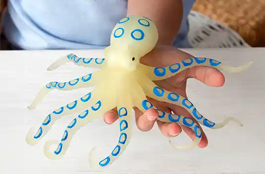 Glow in the dark squishy toy - Octopus. Its soft and durable rubber-like outer material, and micro bead filling, make it great for squeezing, stretching and manipulating. 