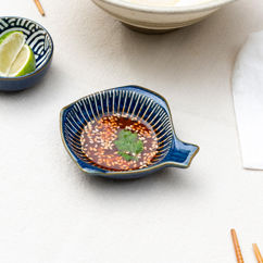 fish-shaped ceramic dipping bowl - radial lines