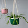 green hanging u shape basket