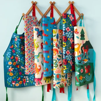 wipeable cotton children's apron - baby dinos wipeable cotton children's apron - baby dinos