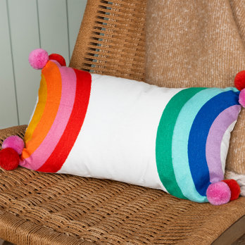embroidered cushion with pom poms - rainbow