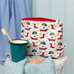 children's wash bag - sunny sausage dog