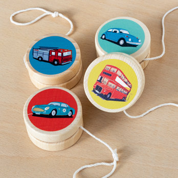 Wooden yoyos decorated with colourful vehicle designs, ideal for museum gift shops or children’s stocking fillers.