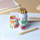 tube of colouring pencils - baby dinos
