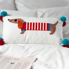 embroidered cushion with pom poms - sausage dog embroidered cushion with pom poms - sausage dog