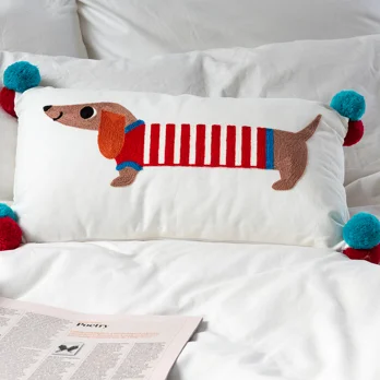 embroidered cushion with pom poms - sausage dog embroidered cushion with pom poms - sausage dog