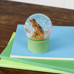 mini glass glitter globe - dinosaur