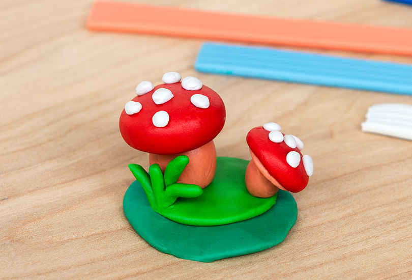 Colourful modelling clay mushrooms