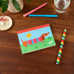 a6 notebook - sunny sausage dog