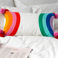 embroidered cushion with pom poms - rainbow