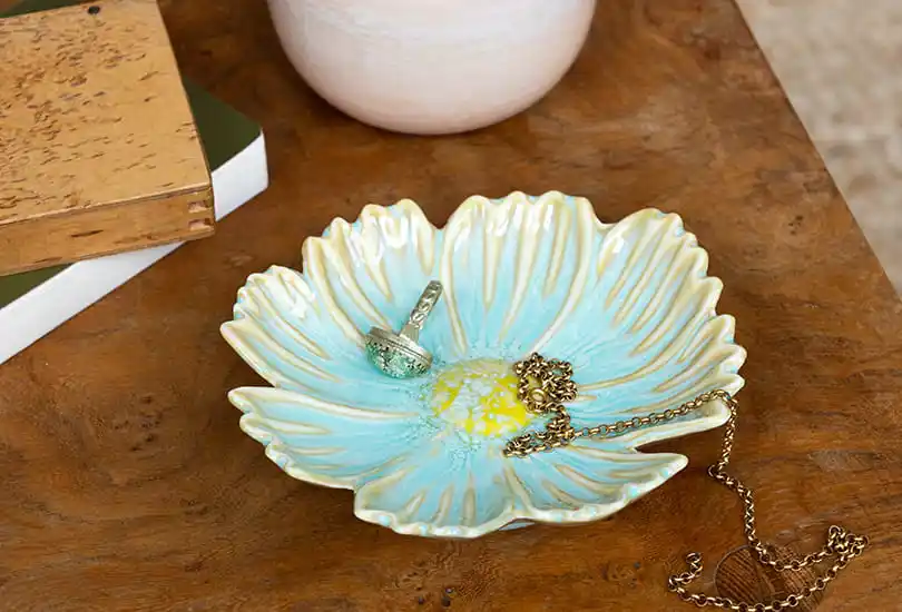 Ceramic trinket dish with an elegant flower shape and design
